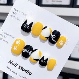 Press-on nails yellow and black cat
